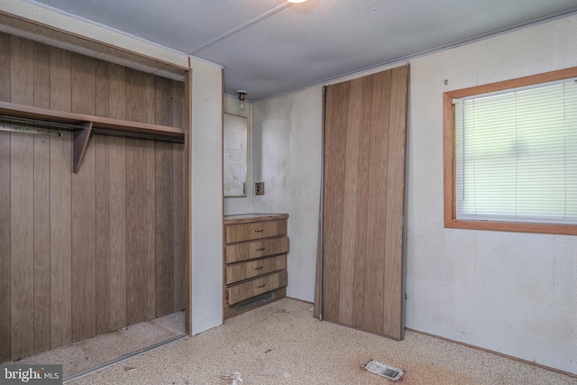 unfurnished bedroom with a closet