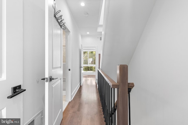 corridor featuring dark hardwood / wood-style flooring