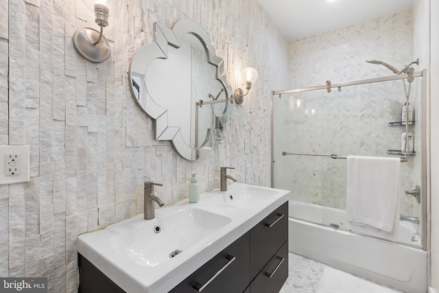 bathroom featuring tile walls, shower / washtub combination, tile floors, and large vanity