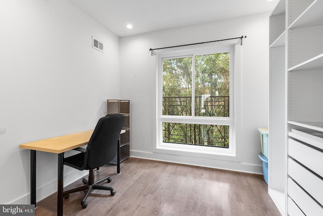 office area featuring hardwood / wood-style floors