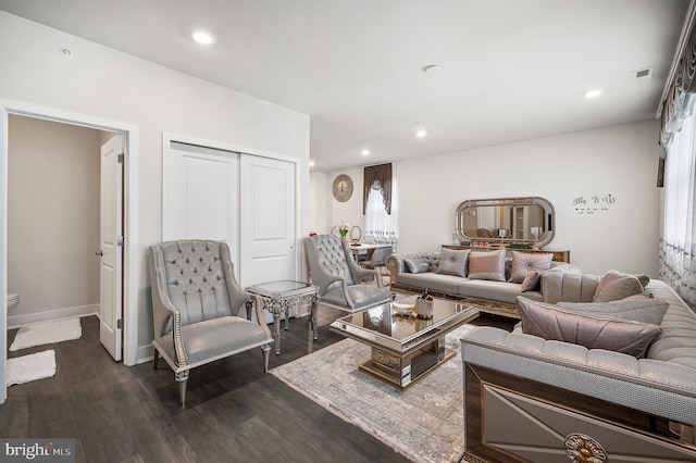 living room featuring dark hardwood / wood-style floors