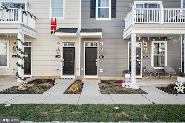 property entrance with a balcony