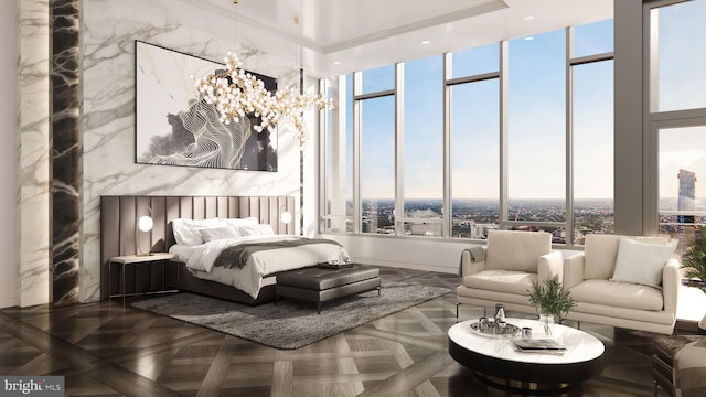 bedroom featuring parquet floors and an inviting chandelier