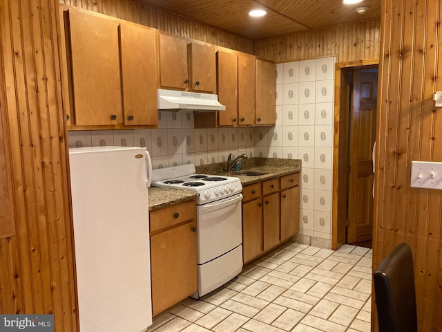 kitchen with white appliances, backsplash, wood ceiling, and sink