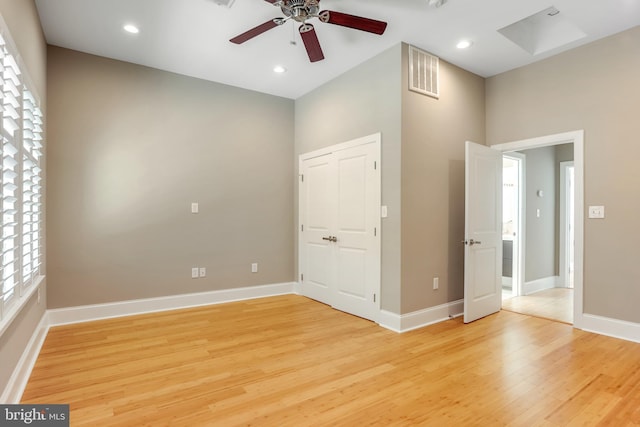 unfurnished bedroom featuring ceiling fan and light hardwood / wood-style floors