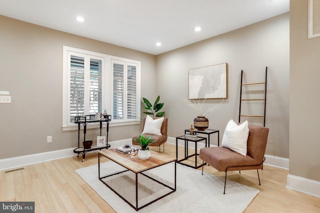 living area featuring light hardwood / wood-style flooring