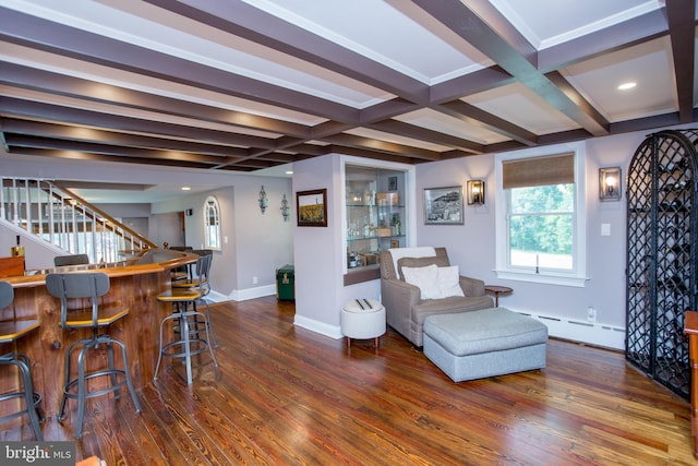 interior space featuring a baseboard radiator, dark hardwood / wood-style floors, coffered ceiling, and beam ceiling