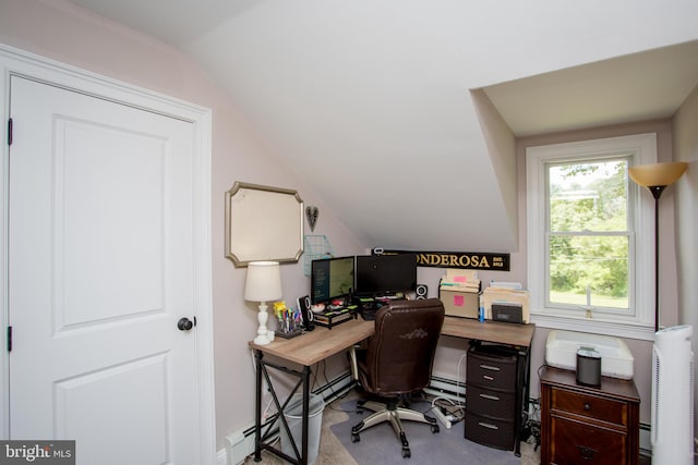 office featuring vaulted ceiling, baseboard heating, and light carpet