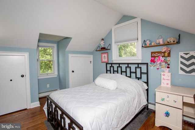 bedroom with dark wood-type flooring, multiple windows, vaulted ceiling, and a baseboard radiator