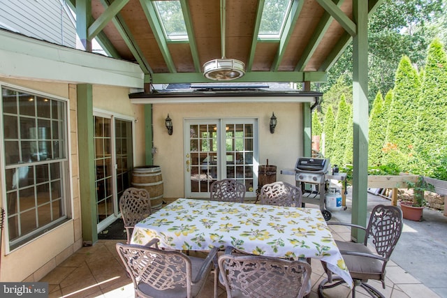 view of patio / terrace with area for grilling and french doors