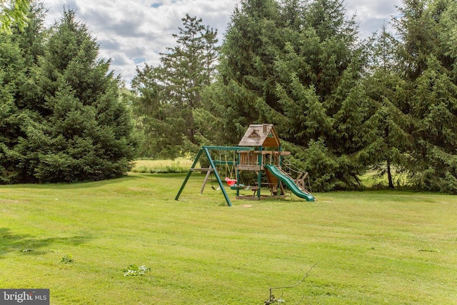 view of jungle gym with a yard