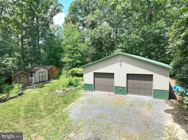 garage featuring a yard