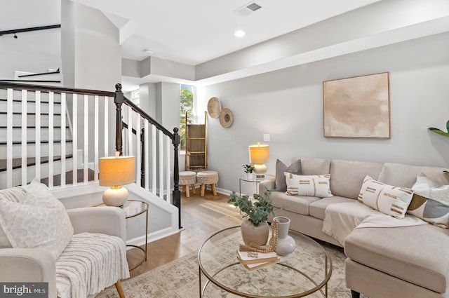 living room with hardwood / wood-style flooring