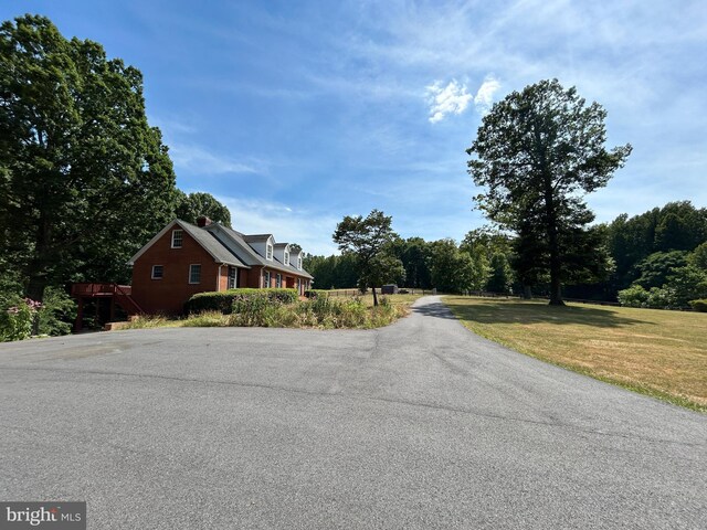 view of community featuring a yard