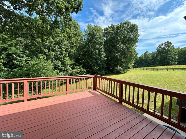 deck featuring a yard