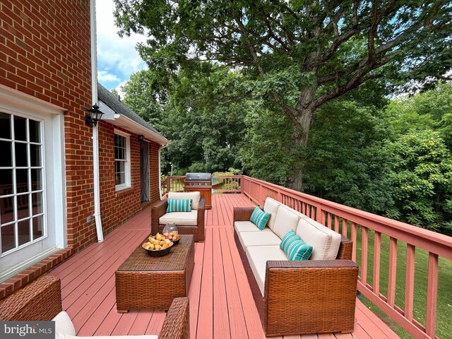 deck with an outdoor hangout area