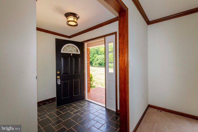 entrance foyer with crown molding