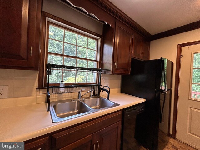 kitchen featuring sink, backsplash, dark brown cabinetry, and dishwasher