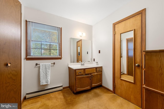 bathroom featuring vanity and a baseboard heating unit