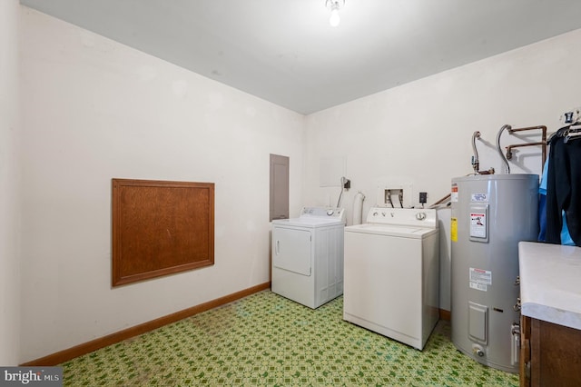 laundry area featuring washer and dryer, light carpet, and electric water heater