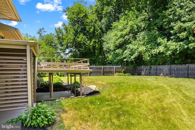 view of yard featuring a deck