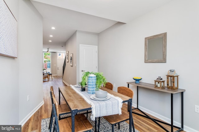 dining space featuring light hardwood / wood-style floors