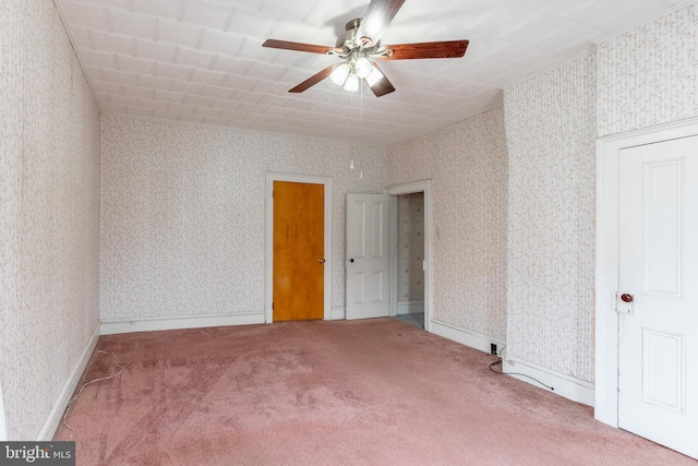 unfurnished bedroom with carpet flooring and ceiling fan