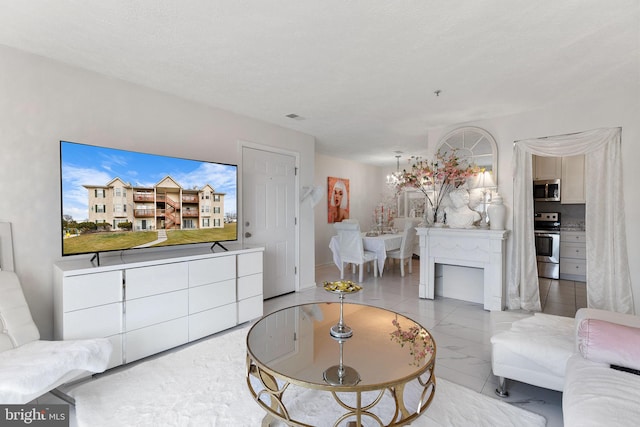 living room with a chandelier