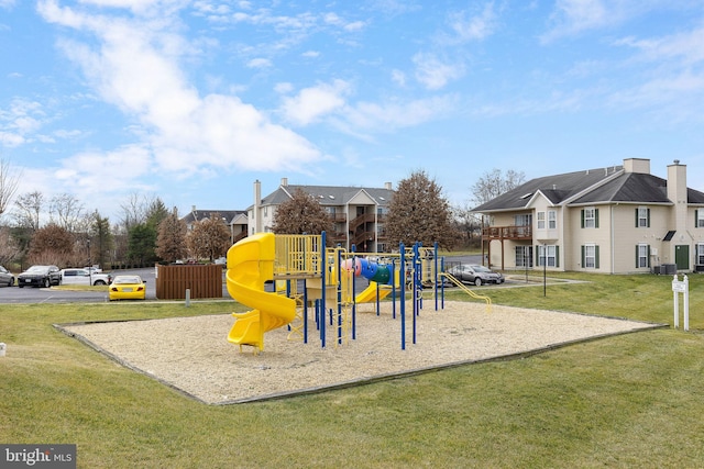 view of playground with a yard