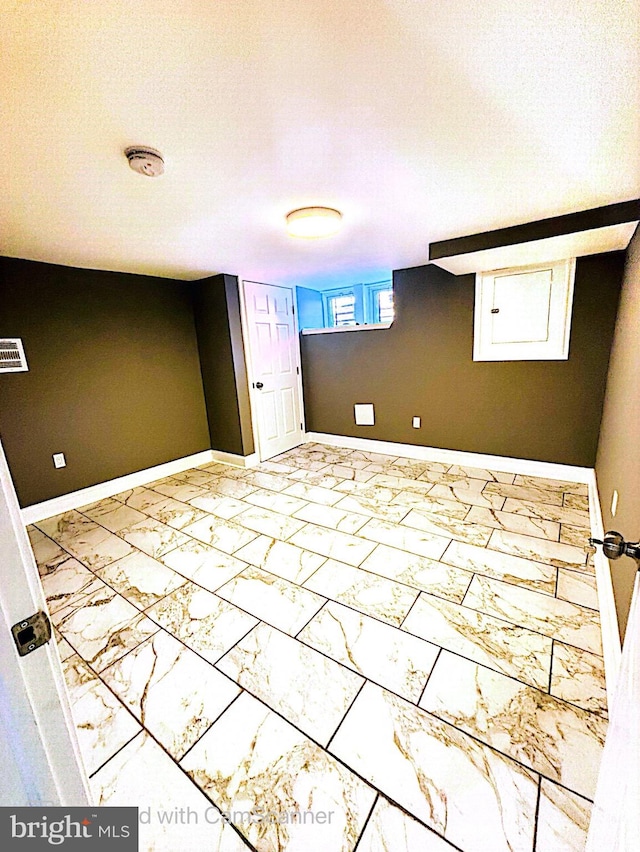 basement with a textured ceiling