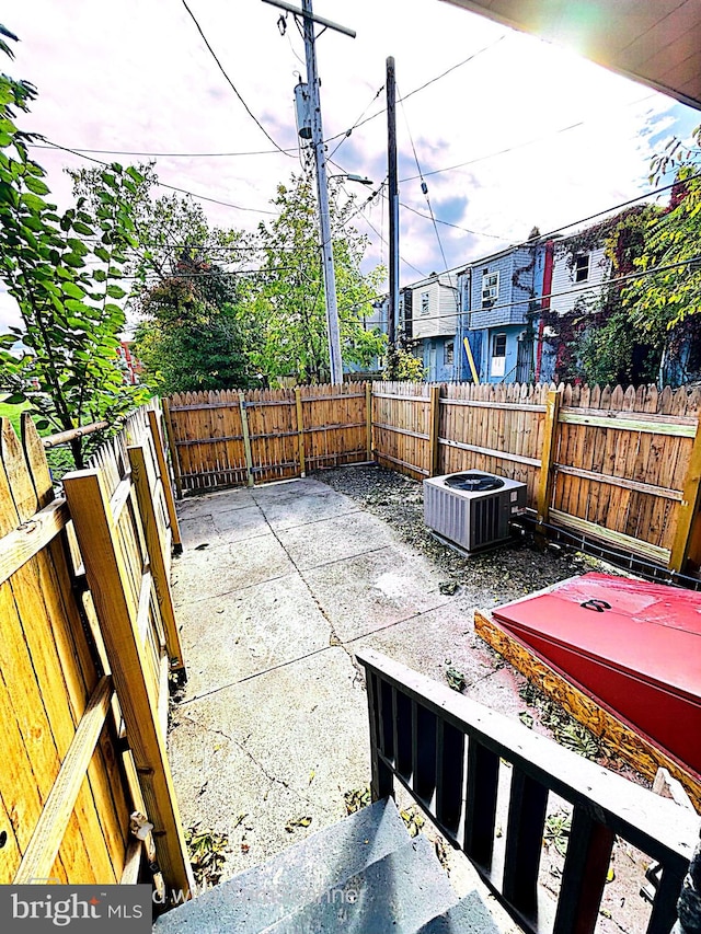 view of patio featuring cooling unit