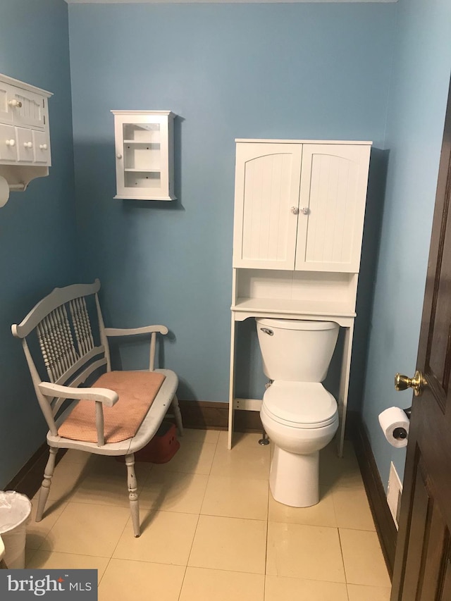 bathroom featuring tile patterned flooring and toilet