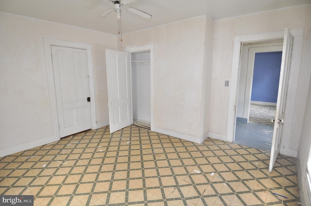 unfurnished bedroom with a closet and ceiling fan