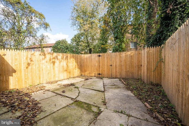 exterior space with a fenced backyard