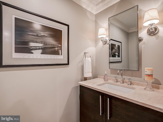 bathroom with vanity and crown molding