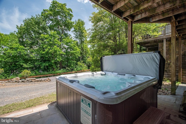 view of patio featuring a hot tub