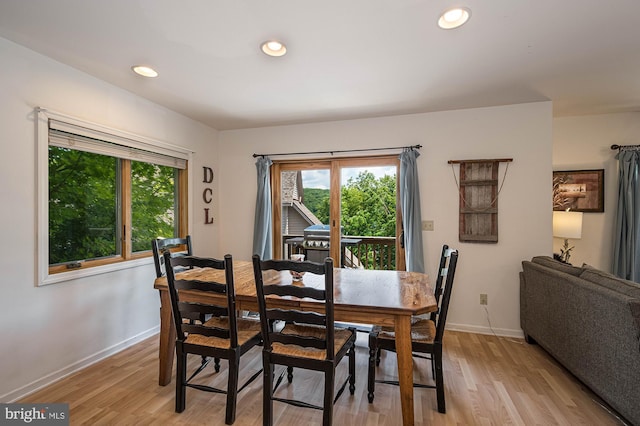 dining area with light wood-type flooring