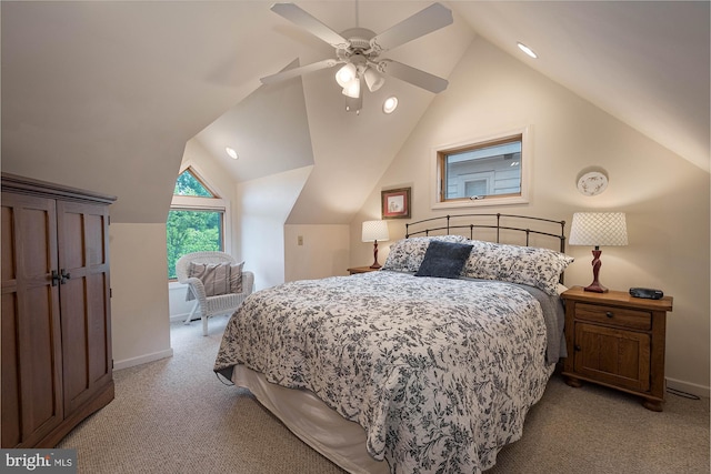 carpeted bedroom featuring vaulted ceiling and ceiling fan