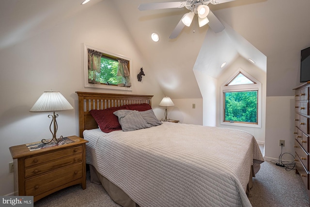 bedroom with ceiling fan, carpet, and lofted ceiling