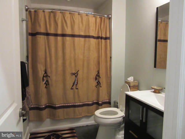 full bathroom featuring shower / bath combination with curtain, toilet, and vanity