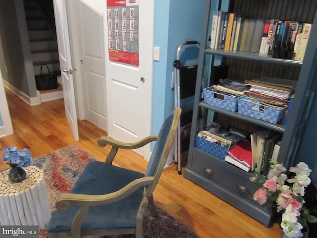 home office with hardwood / wood-style floors