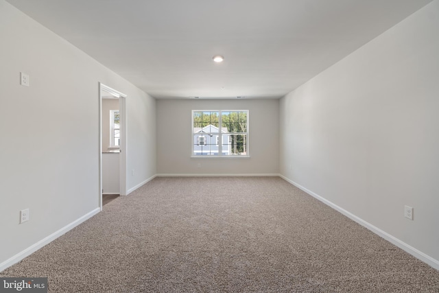 view of carpeted spare room