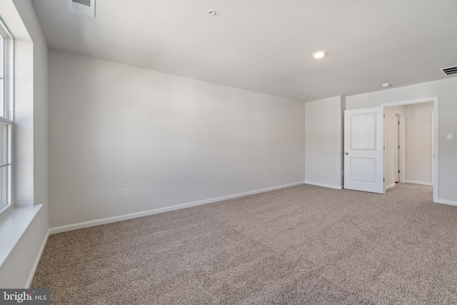 view of carpeted spare room