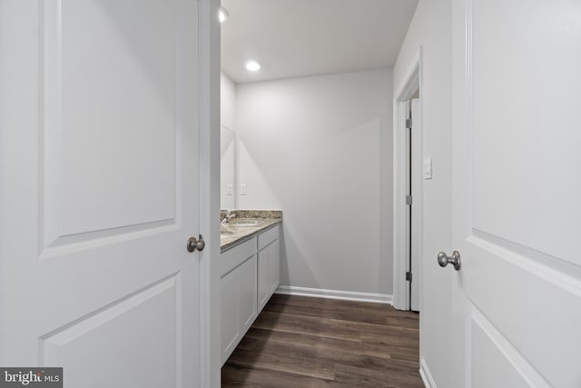 bathroom featuring hardwood / wood-style floors and vanity