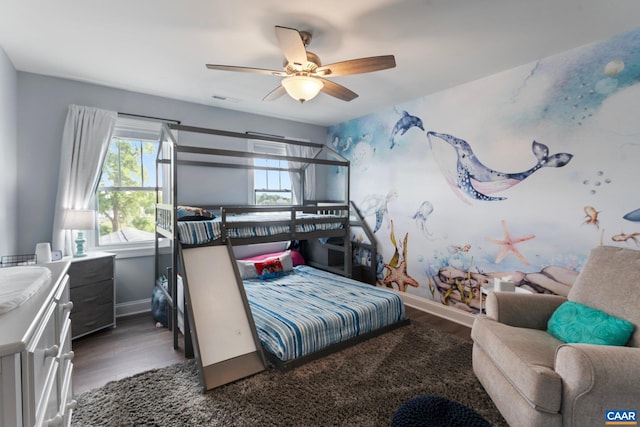 bedroom featuring dark hardwood / wood-style floors and ceiling fan