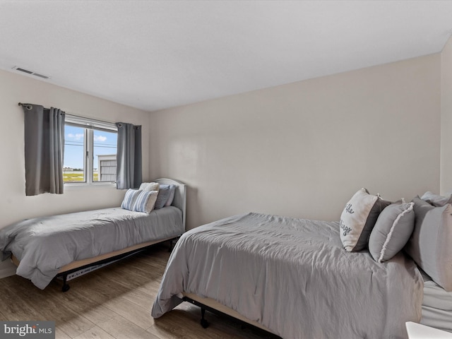 bedroom featuring light wood-type flooring