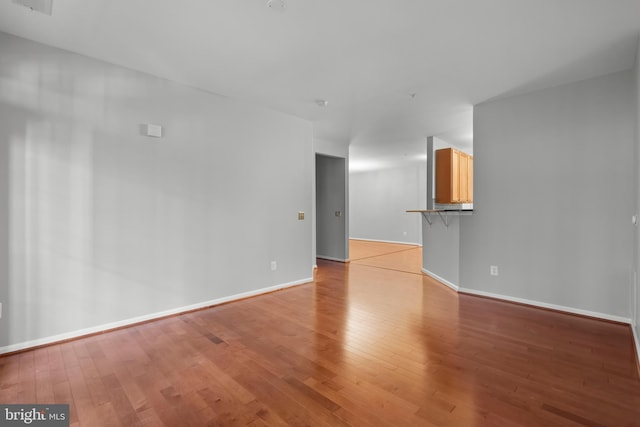 unfurnished living room featuring light hardwood / wood-style flooring