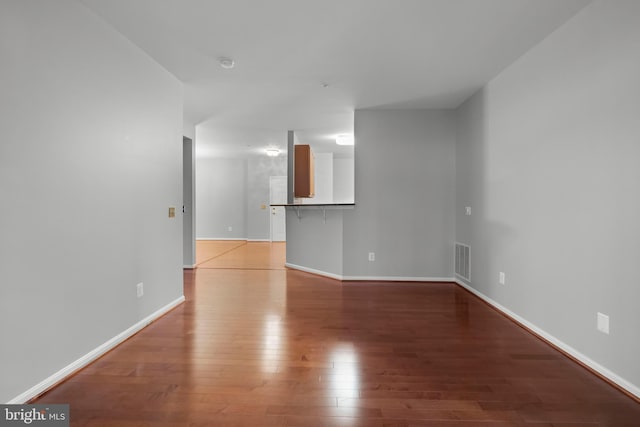 unfurnished living room featuring light wood-type flooring