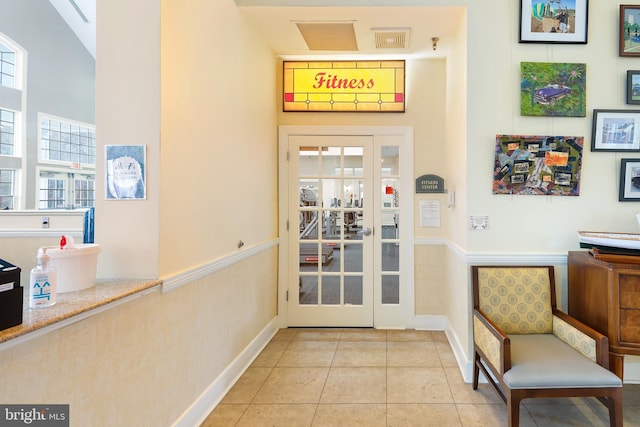 interior space with light tile patterned floors