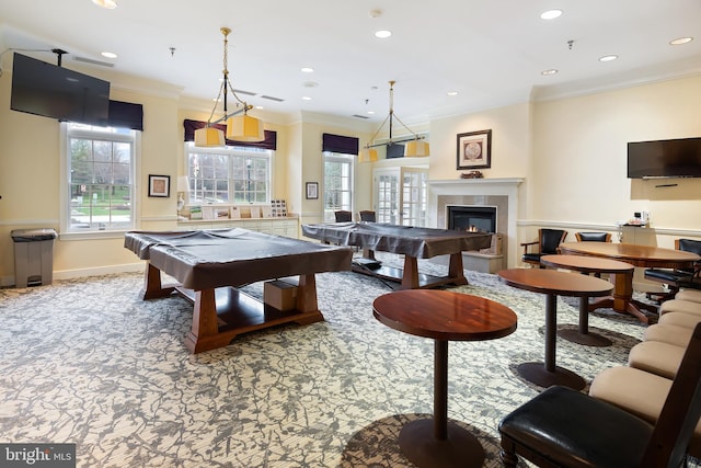 rec room featuring a tile fireplace, crown molding, carpet, and billiards